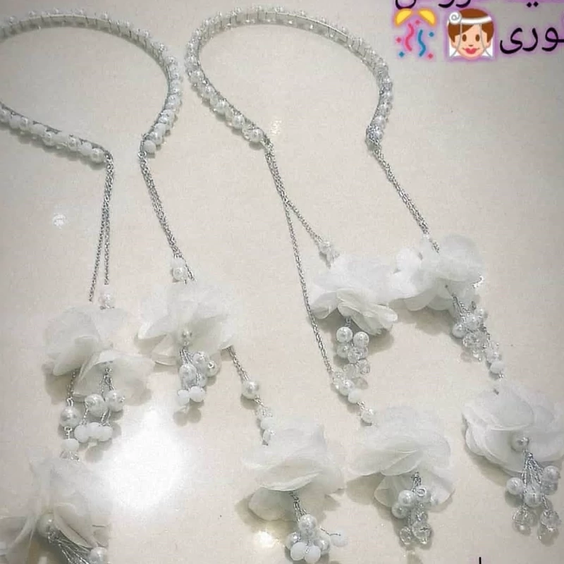 تل های اویز دار  کریستال ومرواریدی با اویز های بغل گوش جذاب در دومدل گلدار وساده
